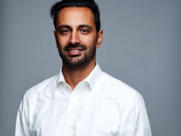 Smiling man in white shirt portrait