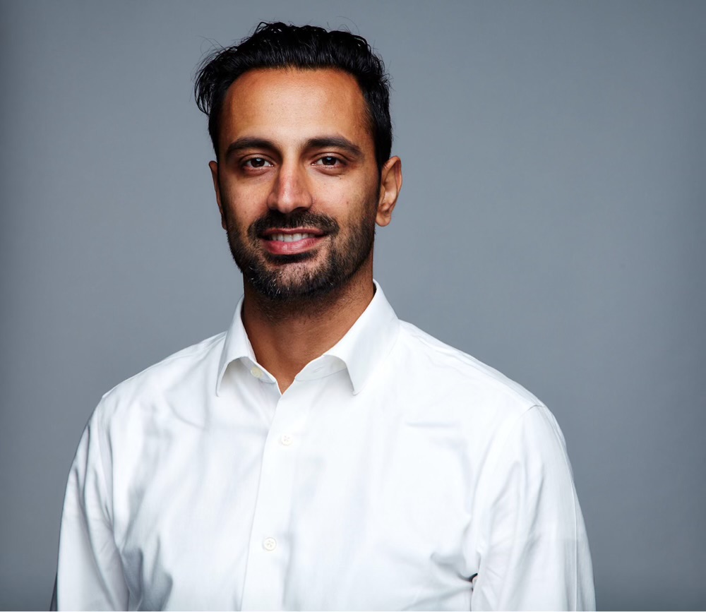 Smiling man in white shirt portrait